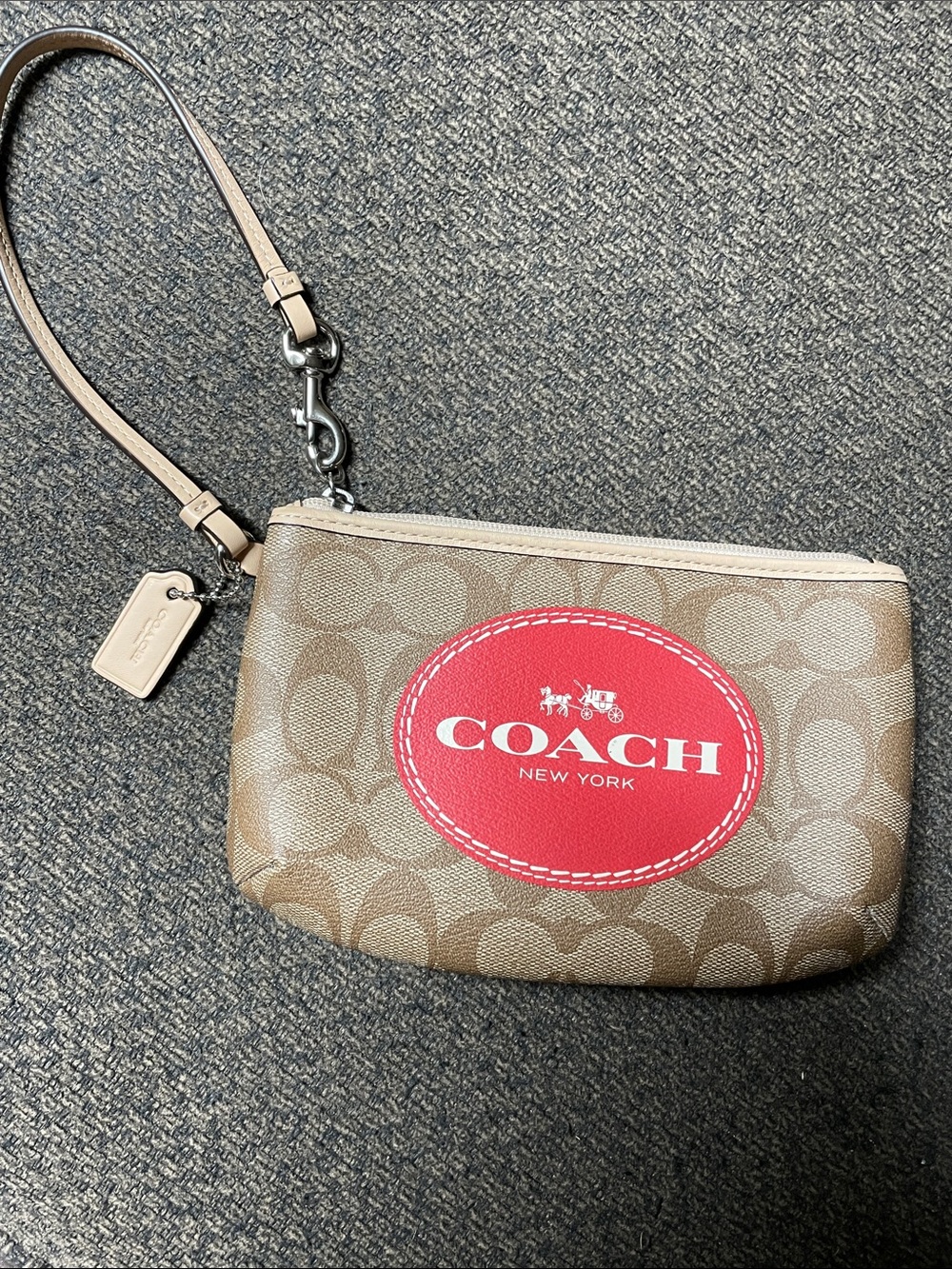 Coach Brown Signature Canvas Wristlet with Red Logo Patch